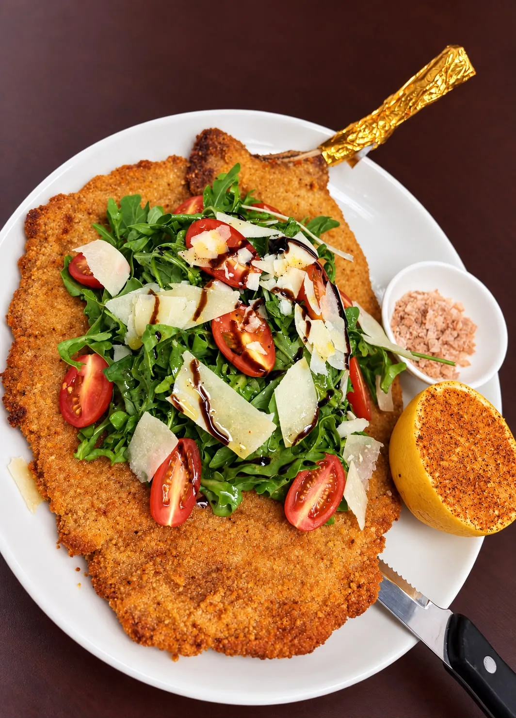Cotoletta alla Milanese with arugula salad at Milano Las Vegas