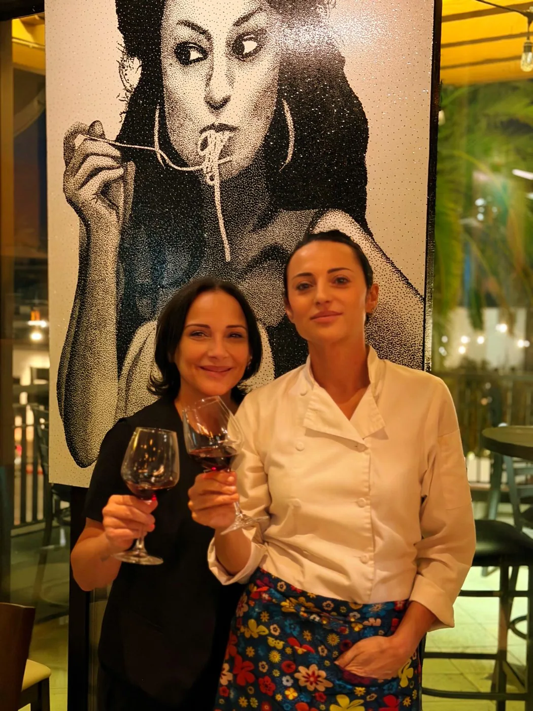 The owners of Milano toasting to five years