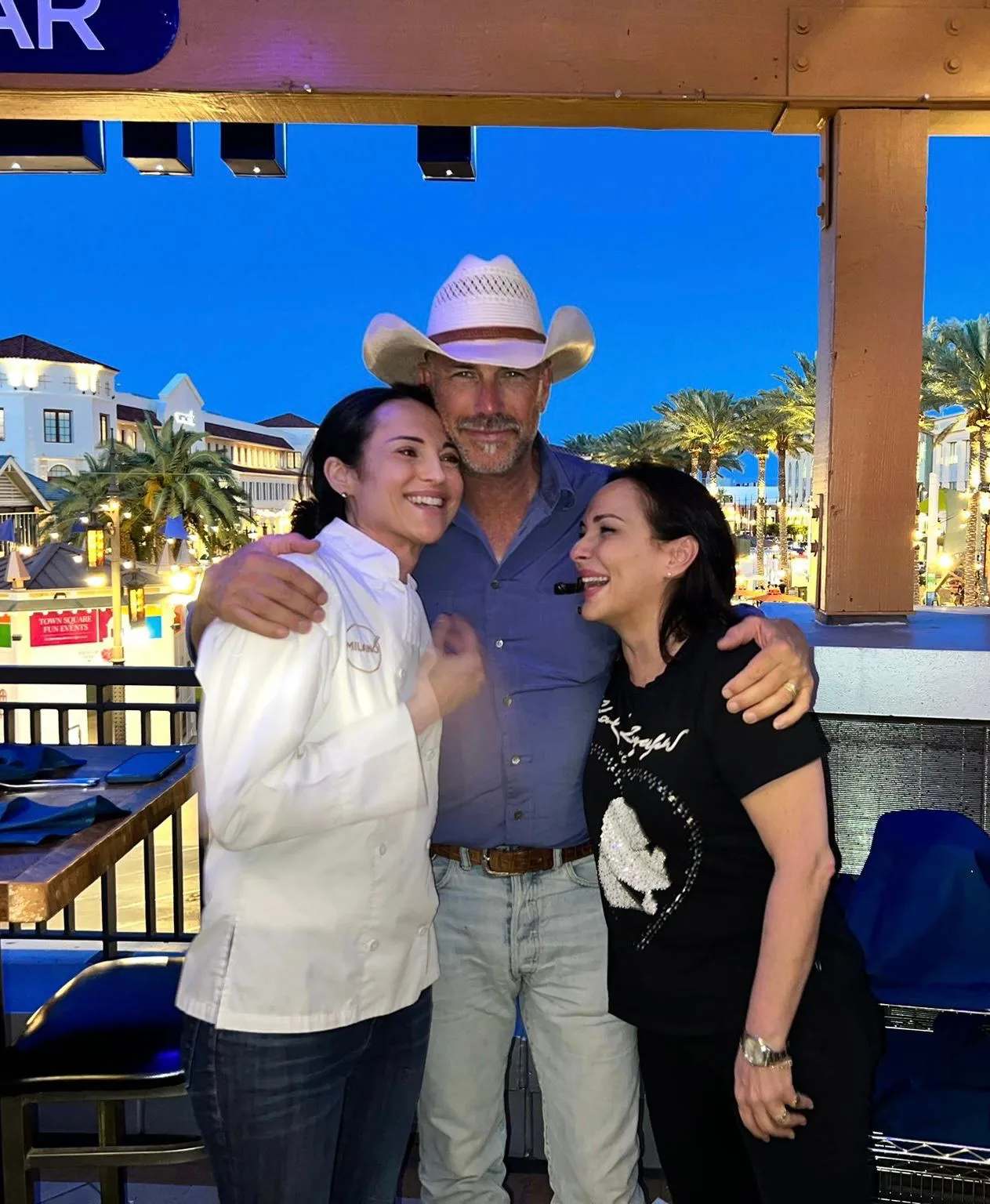 Kevin Costner with Chef Laura Migliorini on the Milano patio at Town Square