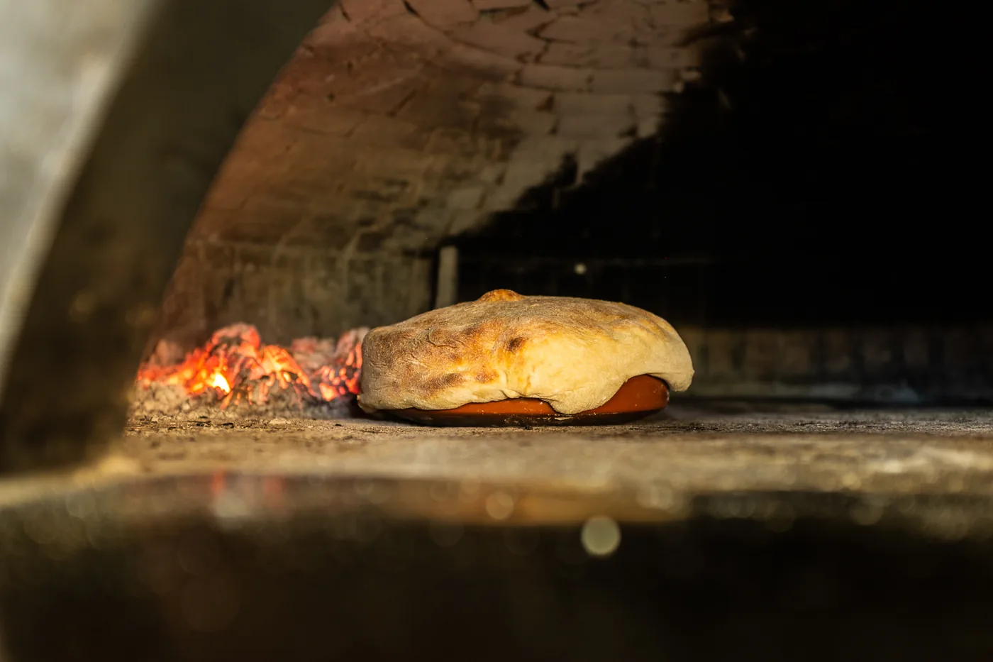 Bread baking in the Milano wood-fired oven